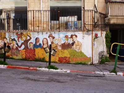 ציור הקיר של מרי בליאן בסיור ציורי קיר וגרפיטי בירושלים. סיורים וטיולים בירושלים בהדרכת נורית בזל - מדריכת טיולים